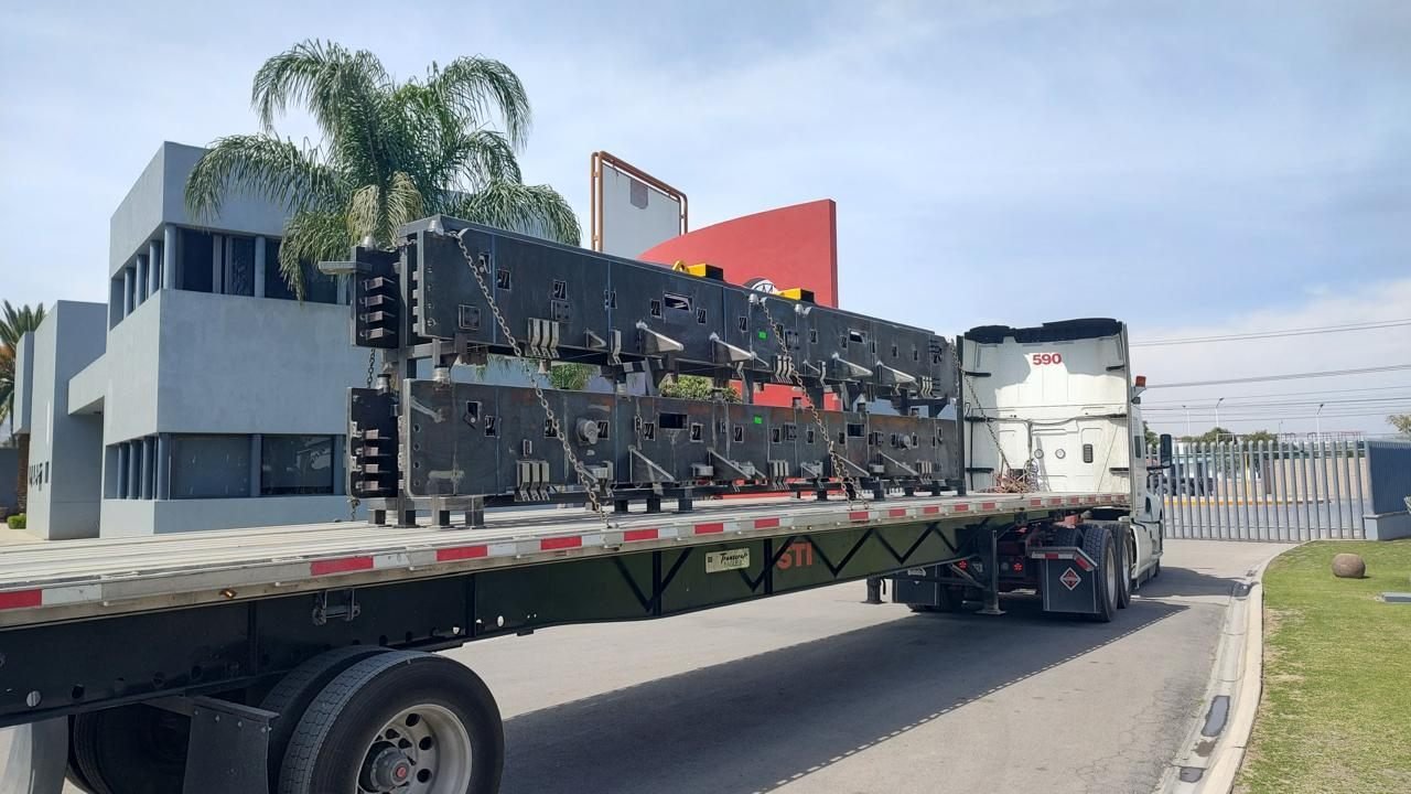 Core clamp assembly loaded on a flatbed for delivery