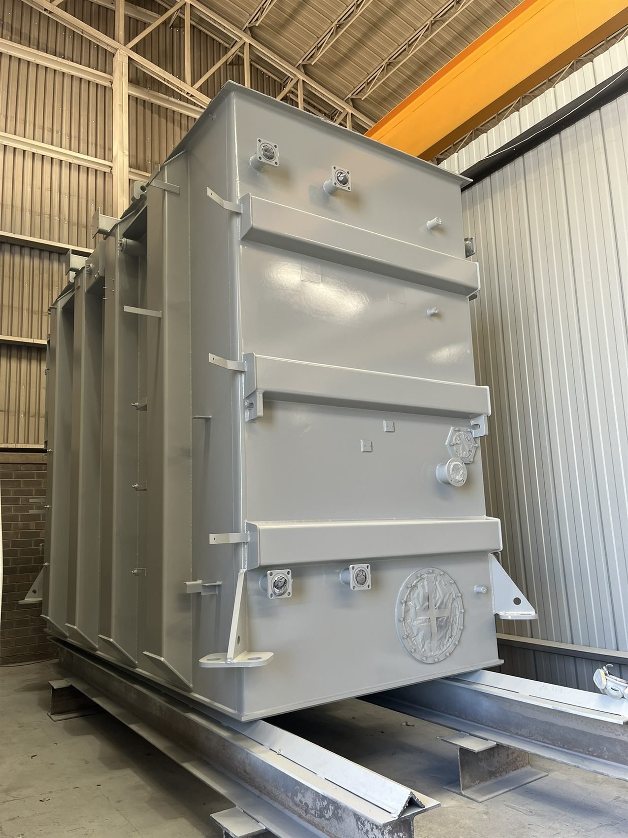 Coated transformer tank
